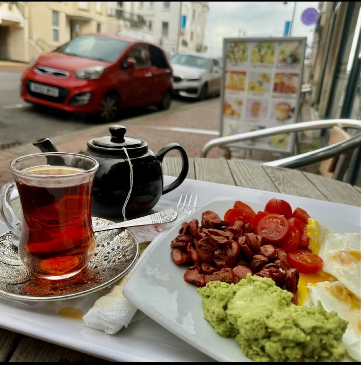Breakfast with a glass of Afghan tea