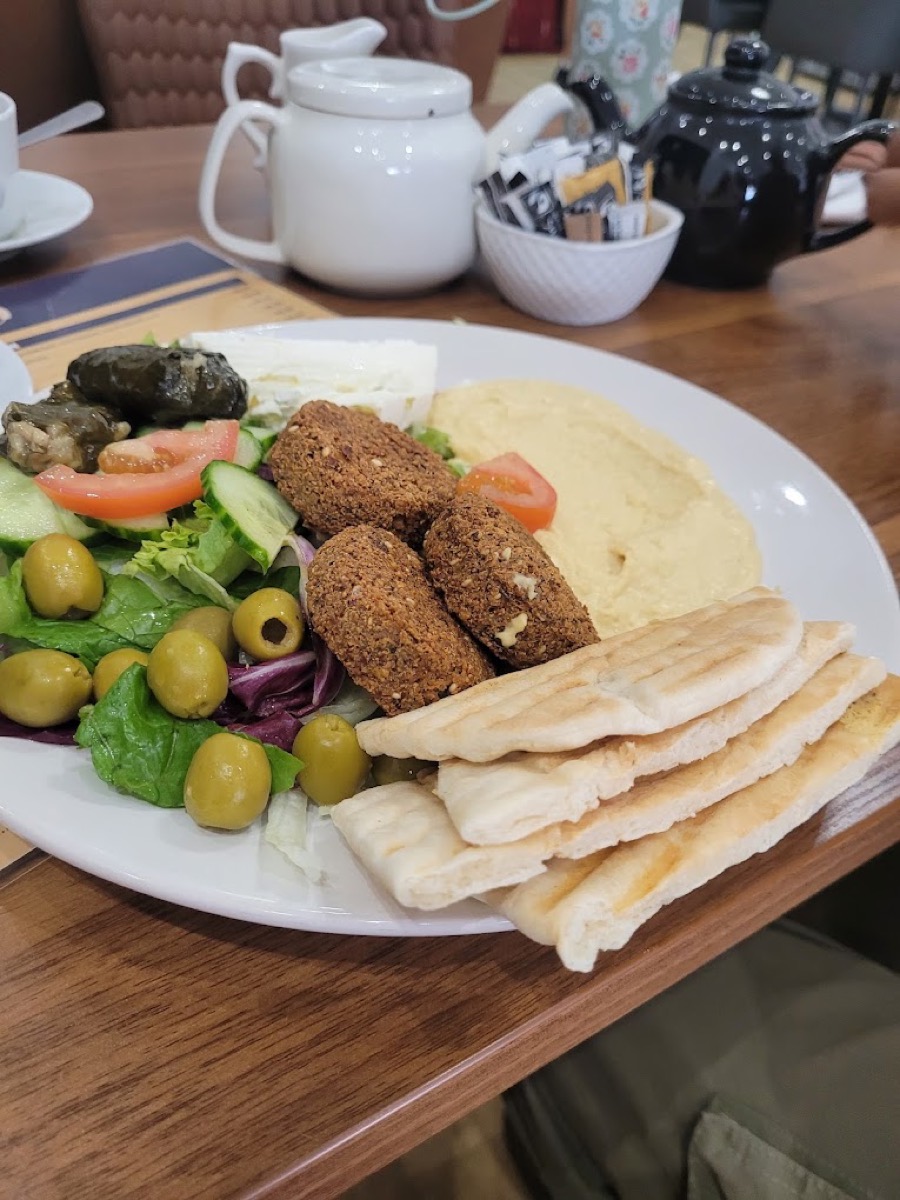 Falafel platter with hummus and olives
